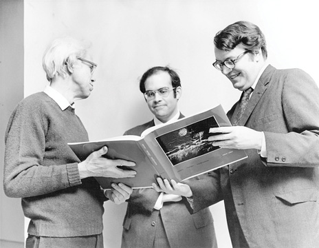 Minor White, Michael E. Hoffman, and Evan Turner, Director of the Philadelphia Museum of Art, during the hanging of <em>The Circle, Square, and Triangle</em>, 1969. 